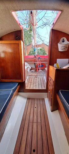Folkboat with metal mast and boom