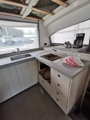 2017 Leopard 43 Powercat kitchen with modern appliances and ample counter space.