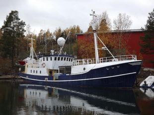 trawler featuring a hostel, event space,