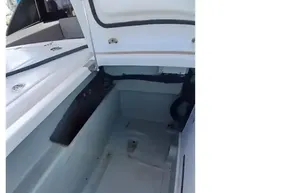 Interior view of a 2022 Leopard 45 boat compartment, showcasing storage space.
