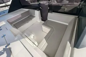 Interior seating area of a 2021 Leopard 50 yacht, featuring modern design and comfortable cushions.