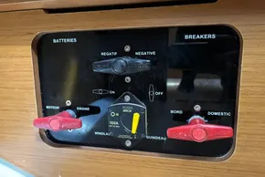 Control panel of a 2020 Jeanneau Sun Odyssey 389 sailboat, featuring battery and breaker switches.