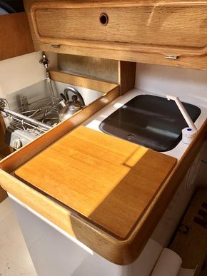 Bainbridge 2 hob cooker with grill.. Sink with large cold storage unit