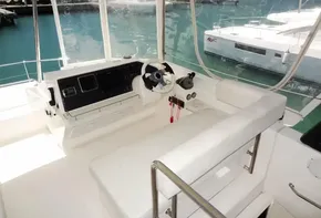 Helm station of 2017 Leopard 43 Powercat with marina view.