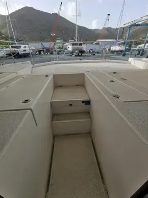 2017 Leopard 43 Powercat on dry dock with mountain backdrop.