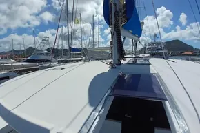 2018 Leopard 45 catamaran docked at marina under blue sky.
