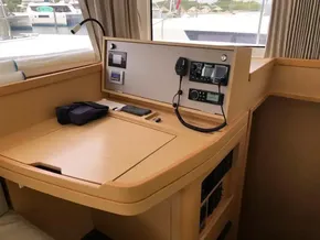 Navigation station on a 2020 Lagoon 42 catamaran with communication equipment.