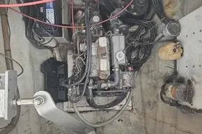 Engine compartment of a 2008 Leopard 38, showing mechanical components and wiring.