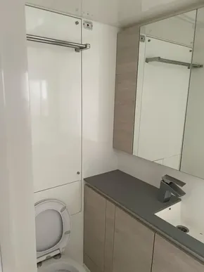 Modern bathroom in Leopard 50 yacht, featuring sleek cabinetry and fixtures, 2020 model.