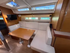 Interior of 2019 Jeanneau Sun Odyssey 440 yacht with cozy seating and modern design.