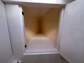 Empty storage compartment inside a 2019 Leopard 40 catamaran.