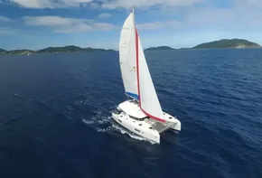 Lagoon 42 catamaran sailing in open sea, 2020 model.