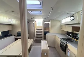 Interior of 2020 Beneteau Oceanis 46.1 yacht, featuring modern kitchen and dining area.