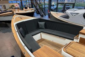 2026 Enkhuizensloep 680 Tender boat interior with sleek seating and wooden accents.