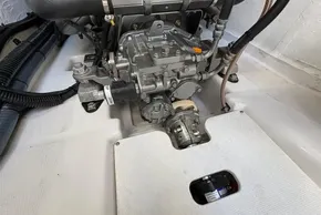 Engine compartment of a 2024 Leopard 40 Powercat, showcasing mechanical components and wiring.