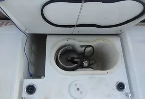 Beneteau Oceanis 41 2017 sailboat storage compartment with open hatch.