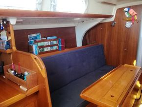 port saloon with pilot berth stowage area
