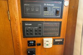 Control panel of a 1991 Sealine 290 Ambassador boat, featuring power switches and indicators.