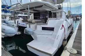 Luxury Leopard 45 catamaran yacht docked, featuring spacious deck and modern design, 2020 model.