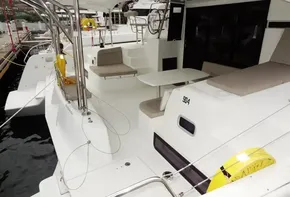 2020 Lagoon 42 catamaran with spacious deck and seating area.