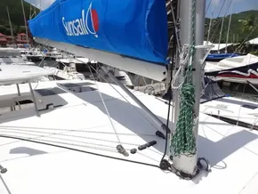 2021 Leopard 40 catamaran with blue sail cover, docked in a marina.