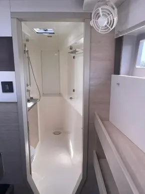 Modern bathroom in a 2020 Leopard 50 yacht with sleek design and ample lighting.