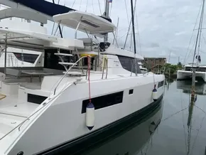 2021 Leopard 45 catamaran docked in a marina, featuring sleek design and modern amenities.