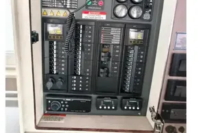 Electrical control panel of a 2020 Leopard 45 yacht, featuring various switches and gauges.
