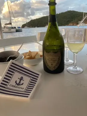 Champagne and snacks on a yacht with a scenic ocean view, Leopard 40, 2020.