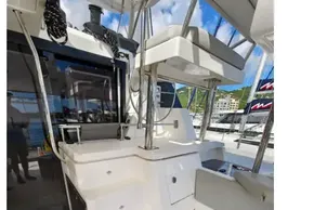 2021 Leopard 50 yacht interior with stairs and seating area, featuring modern design.