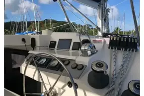 Helm of 2020 Leopard 40 catamaran with steering wheel and navigation equipment.