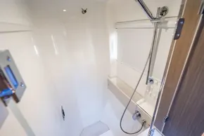 Modern shower area in 2025 Leopard 46 yacht, featuring sleek design and chrome fixtures.