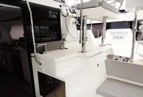 Leopard 50 yacht interior, 2020 model, featuring modern kitchen and seating area.