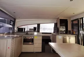 Interior of 2017 Leopard 43 Powercat kitchen with modern appliances and ample counter space.