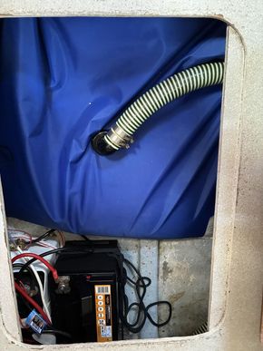 Flexible fresh water tank and battery stowage