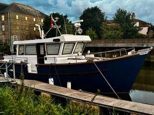 SHARES Motor boat nestled in Sandwich