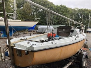 17 ft lift keel, trailer, outboard.