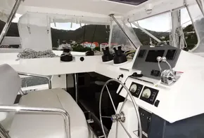 Interior helm of 2020 Leopard 50 yacht with navigation equipment and scenic view.