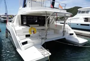 2017 Leopard 43 Powercat docked, rear view showing spacious deck and seating area.