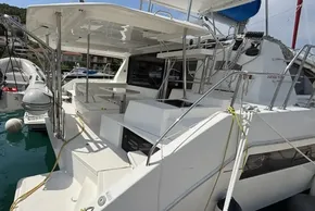 2019 Leopard 40 catamaran docked, featuring spacious deck and seating area.