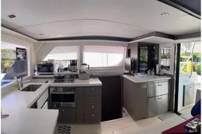 Modern kitchen interior of 2022 Leopard 45 yacht, featuring sleek appliances and ample counter space.