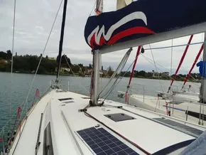 2017 Beneteau Oceanis 45 sailboat on calm water, showcasing deck and sails.