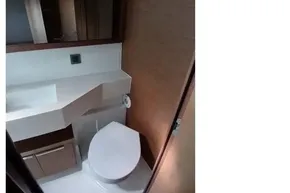 Modern bathroom interior in 2020 Lagoon 46 yacht, featuring sleek design and compact layout.