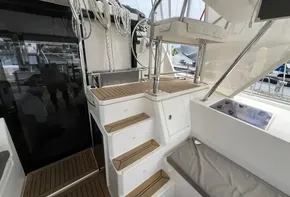 Leopard 45 catamaran 2019 model, featuring teak steps and cockpit area.