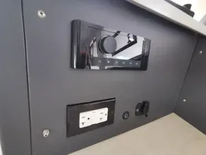 Control panel and power outlets on a 2017 Leopard 51 Powercat yacht.