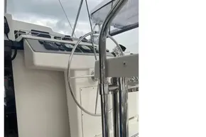 Helm of 2020 Leopard 40 catamaran with steering wheel and control panel.