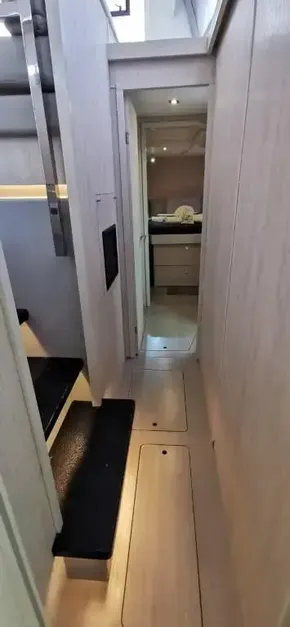 Interior hallway of 2019 Leopard 51 Powercat yacht with modern design.