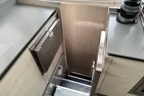 Modern kitchen area in a 2021 Leopard 50 yacht, featuring sleek countertops and appliances.