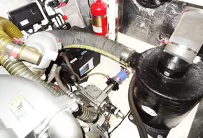 Engine compartment of a 2020 Leopard 43 Powercat with fire extinguisher and various components.