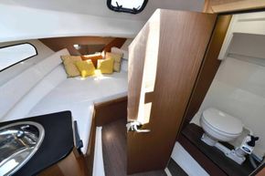 Jeanneau Cap Camarat 7.5 WA - cabin with galley and toilet compartment